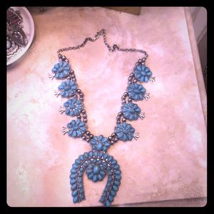 Faux turquoise squash blossom